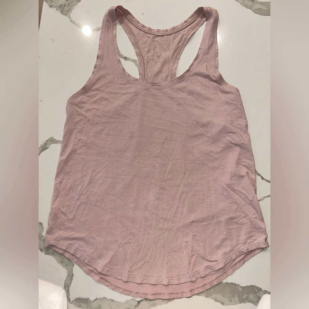 Very cute “love tank top”!Lulu lemon light pink loose fit! Size 6